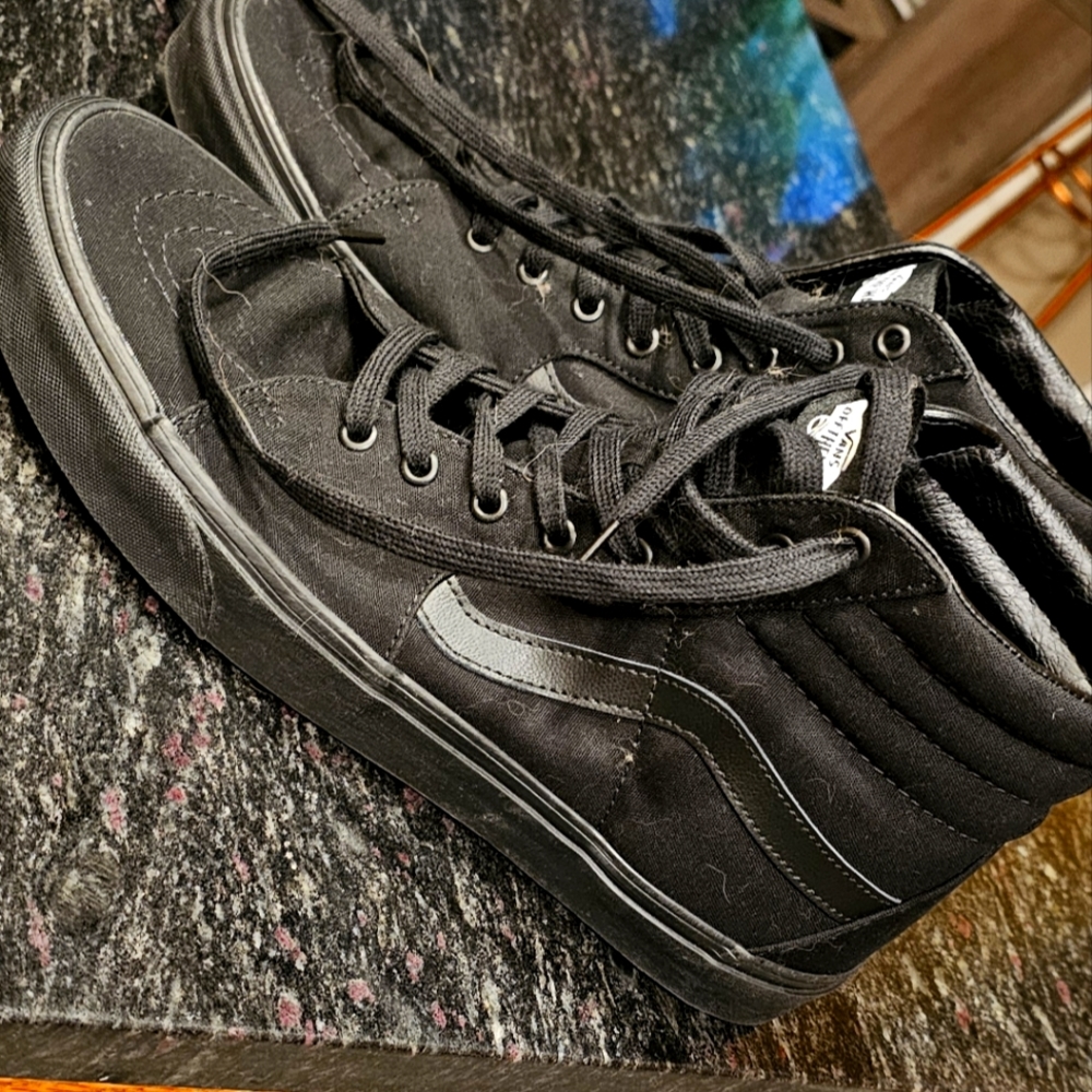 Black hi-top Vans